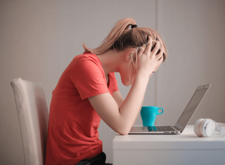 Woman Stressed at Desk